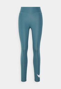 Türkise Sportleggings mit hohem Bund, aus dehnbarem Material. Mit einem dezenten weißen Logo am Unterschenkel. Angenehm glatte Textur.