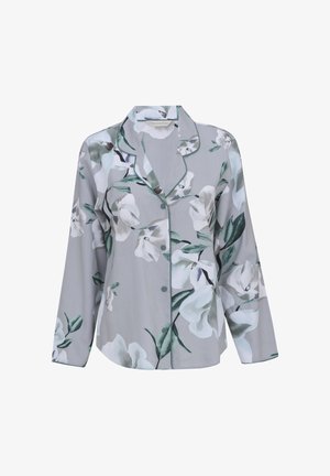 Haut de pyjama gris à manches longues avec boutons, imprimé floral blanc et vert, et passepoil vert le long du col et du bord avant.