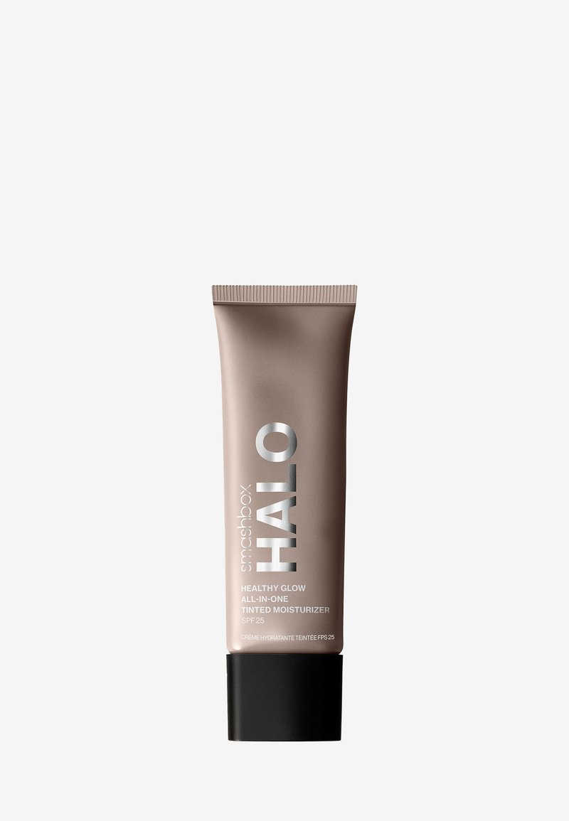 Tube mit Smashbox Halo Healthy Glow All-In-One getöntem Feuchtigkeitscreme mit LSF 25, hellbraune Farbe und schwarzem Deckel.