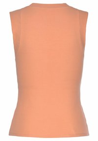 Top senza maniche a coste in pesca chiaro. Presenta un collo rotondo e una silhouette aderente, realizzato in materiale elastico per il comfort.