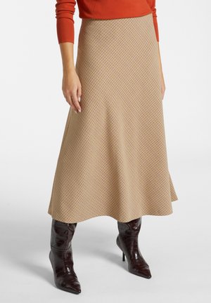 - Spódnica trapezowa