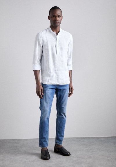 Tiger of Sweden PISTOLERO - Slim fit jeans - light blue