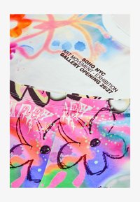 Valittu, white graffiti