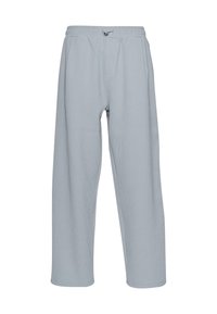 Pantalones de pierna ancha grabados en un gris claro. Cuentan con una cinturilla elástica con cordón y bolsillos laterales. Textura suave.