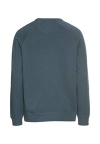 Ciemnoniebieski sweter z fakturowanym wykończeniem, z rękawami raglanowymi, ściągaczami przy mankietach i dolnej krawędzi. Prosty design bez widocznych logo czy wzorów.