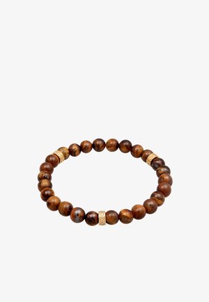 Náramok z hnedého tigra s okom, ktorý obsahuje striedajúce sa lesklé korálky a akcenty z kovu v zlatej farbe, okrúhly tvar a elastický dizajn.