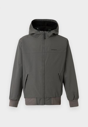 Γκρί φούτερ με κλείσιμο φερμουάρ και κουκούλα, διαθέτει ελαστικούς μανικιών και στριφώματα, δύο πλαϊνές τσέπες και λείο, αδιάβροχο φινίρισμα.