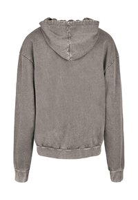 Felpa grigia con cappuccio, dal texture morbido, vestibilità ampia e polsini e orlo a coste. Presenta un design semplice con una parte anteriore non visibile.