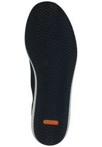 Schwarze Gummisohle mit einem Fischgrätprofil, die mit einem weißen Seitenbesatz und einem kleinen orangefarbenen "dynergy"-Logo versehen ist.