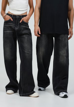 UNISEX - Wijde jeans - washed black