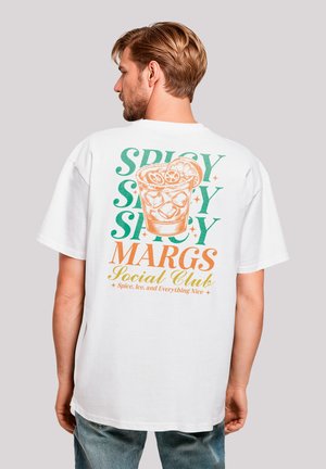 White cotton t-shirt featuring a colorful graphic on the back: a glass with ice and lime, text in green, orange, and yellow. Relaxed fit.