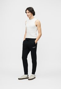 Jack & Jones JPSTGORDON ARCHIVE PANTS - Παντελόνι φόρμας - black