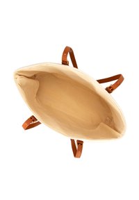 Borsa tote in tela beige con manici in pelle marrone. La parte superiore aperta rivela un rivestimento in tessuto morbido e leggero senza ulteriori scomparti o dettagli.