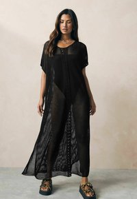 Next Svetríkové šaty - black