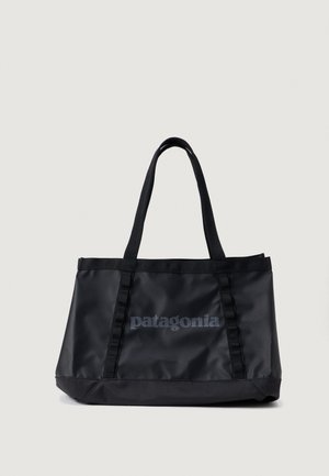 HOLE TOTE UNISEX - Kézitáska - black