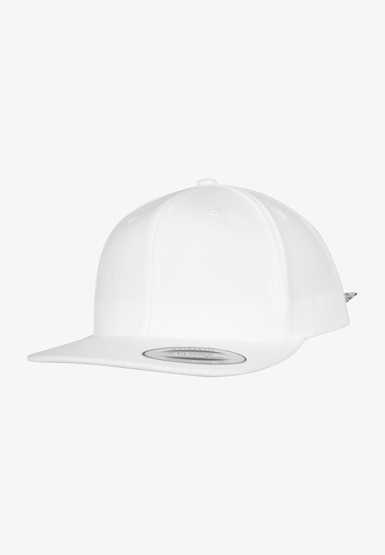White snapback cap with a structured design, flat brim, and textured fabric. Features a circular logo patch on the front.