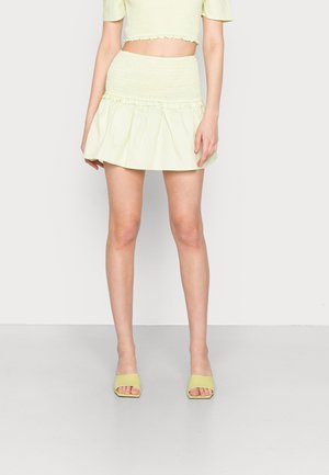 SMOCKED MINI SKIRT WITH PEPLUM - Minissaia - apple green