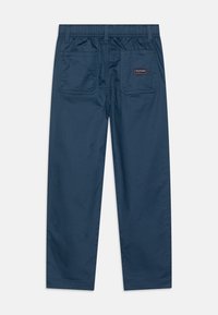 Tommy Hilfiger MONOTYPE SKATER PANT - Hlače - aegean sea