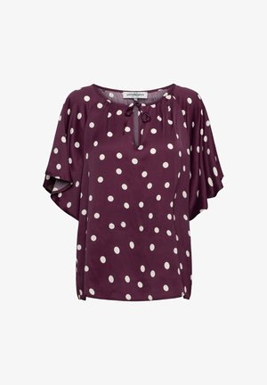 Paarse blouse met korte mouwen en witte polkadots, ronde hals met keyhole en striksluiting, losse pasvorm.