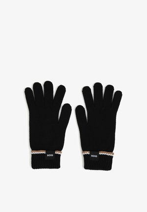 Paire de gants tricotés noirs avec bordure marron et blanche et étiquettes noires marquées BOSS sur les poignets, montrés à plat, paumes vers le bas.