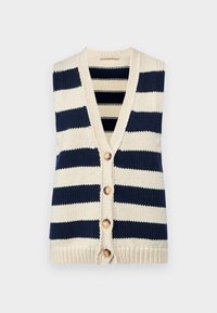 Kootud ilma varrukateta kardigan, millel on tumesinised ja kreemjad horisontaalsed triibud. Omab V-kaela, viit puitnuppu ja soonikkoesääriseid.