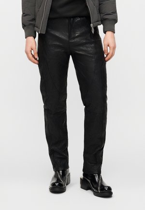 CRUNCH PANTS - Kožené nohavice - black