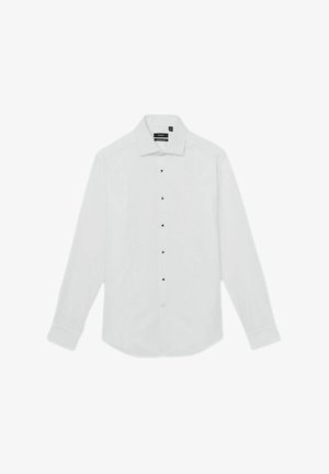 Valge pika varrukaga särk, millel on terav krae, mustad nupud ees ja kaardus hem. Sile tekstuur.