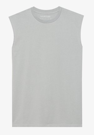 Camiseta sin mangas de color gris claro, hecha de algodón suave, con cuello redondo y dobladillo recto, con sutiles detalles de costura.