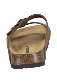 Sandale marron avec une semelle en liège, deux lanières en cuir et boucle réglable. La semelle texturée offre une bonne adhérence ; l'intérieur est plat et lisse.