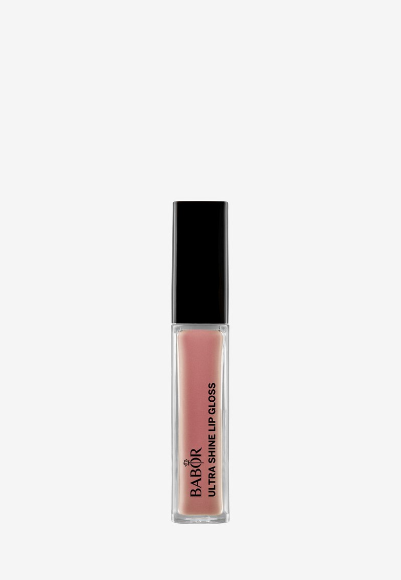 Babor Ultra Shine Lip Gloss in un tubo trasparente con tappo nero, presenta una tonalità di rosa morbido e una consistenza liscia e lucida.
