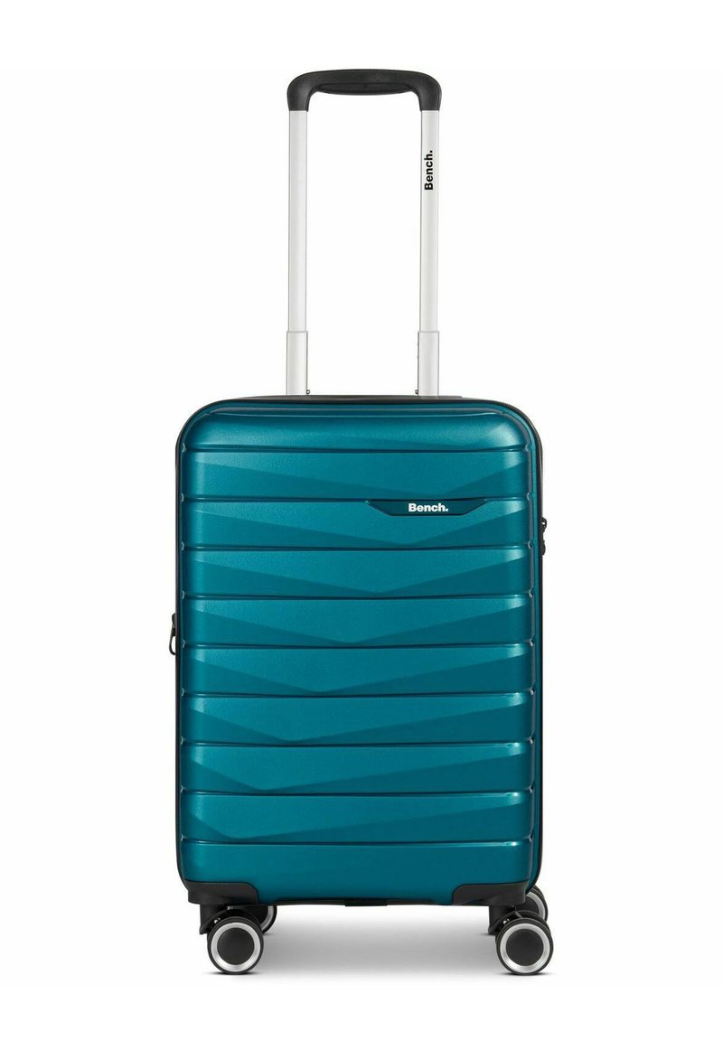 Türkisfarbene Hartschalen-Reisetasche mit einem strukturierten Zickzack-Muster, ausgestattet mit einem ausziehbaren Griff und vier multidirektionalen Rädern für eine einfache Mobilität.