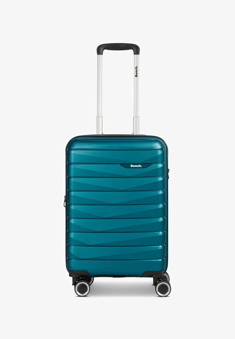 Türkisfarbene Hartschalen-Reisetasche mit einem strukturierten Zickzack-Muster, ausgestattet mit einem ausziehbaren Griff und vier multidirektionalen Rädern für eine einfache Mobilität.