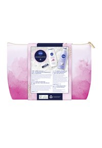 NIVEA beauty bag, featuring a gradient pink watercolor design, zip closure with gold accent, and contains multiple skincare products.