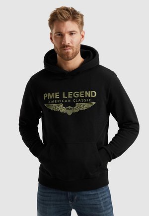 Zwarte hoodie gemaakt van een katoenmix, met een kangoeroezak en een gouden vleugel logo op de voorkant. Casual fit.