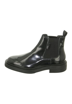 Schwarze Lackleder Chelsea Boots mit elastischen Seitenteilen, einer abgerundeten Zehenpartie und einer strukturierten schwarzen Gummisohle. Mit einer Zuglasche an der Rückseite.