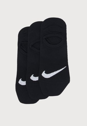 Melnas potītes zeķes, kas izgatavotas no teksturēta auduma, ar baltu Nike swoosh logotipu priekšpusē. Iekļautas trīs zeķes iepakojumā.