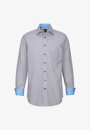 Camicetta blu a fantasia con maniche lunghe, polsini azzurri a contrasto e una piccola tasca sul petto. Realizzata in tessuto leggero.