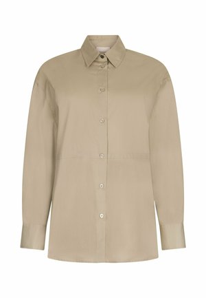 Chemise beige à manches longues boutonnée, avec col classique et manches à poignets, présentée sur fond blanc.