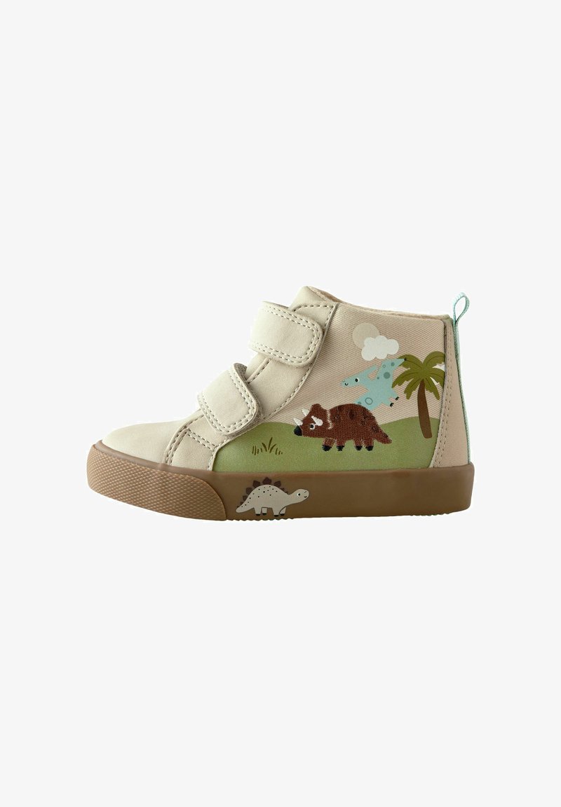 Beige toddler shoe with two Velcro straps, dinosaur and palm tree illustrations on sides, and brown rubber sole with small dinosaur detail.