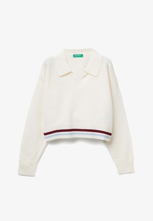 Zkrácený krémový svetr s výstřihem do V a límcem. Obsahuje červené a modré pruhované akcenty na lemu a ribbed manžety. Měkká textura.