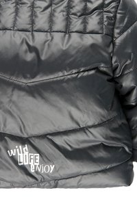 Black quilted jacket section with white text "wild life enjoy" printed near the bottom hem.