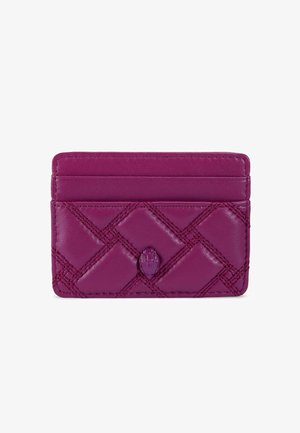 Purple leather cardholder with quilted pattern, featuring multiple card slots and a textured logo accent at the front. Smooth finish.