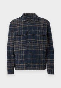 Πουκάμισο-ζακέτα σε καρό μοτίβο σε ναυτικό μπλε και καφέ, με κουμπιά, δύο τσέπες στο στήθος με πλαϊνές πτυχές, κλασικό γιακά, μακριά μανίκια και ίσιο τελείωμα.