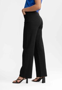 MELA HOHEM BUND WEITEM BEIN  - Broek - schwarz
