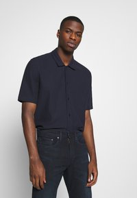 Levi's® 502 TAPER - Calças de ganga de corte afunilado - blue ridge