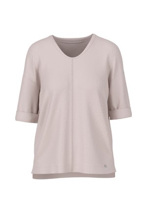 Light pink short-sleeve top with a V-neck, textured fabric, and rolled sleeves. Features a straight cut and subtle logo detail at the hem.