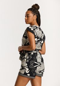 Shiwi Overal - black sea pearl