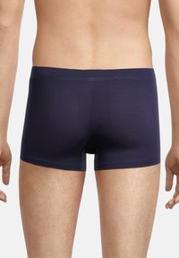 Navy blue cotton boxer briefs with a smooth texture, elastic waistband, and short leg length. No visible seams or patterns.