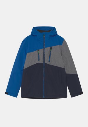 Veste zippée bleue et grise avec capuche, dotée d'une partie inférieure bleu marine, de deux poches zippées et de zips contrastés. Tissu lisse et léger.