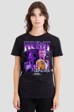 Young woman wearing a black T-shirt with purple graphic illustrations and text reading "RUMI," "HUNTRX," and "K-POP DEMON HUNTERS."